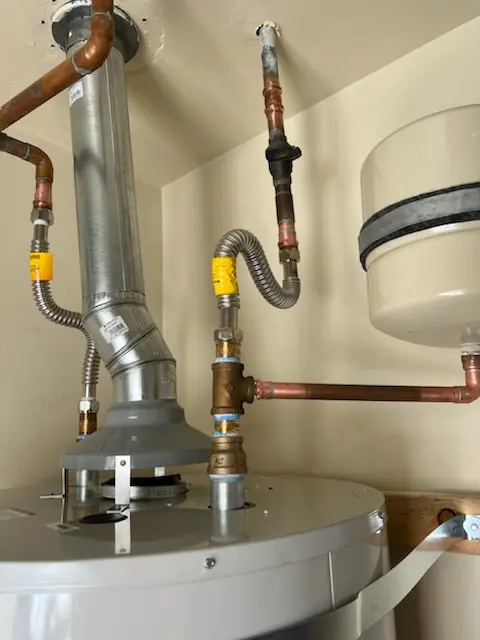 Water heater installation and plumbing repair in Show Place